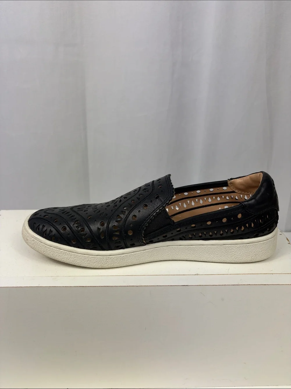 UGG CAS‎ Perforated Slip On Sneaker in Black.
